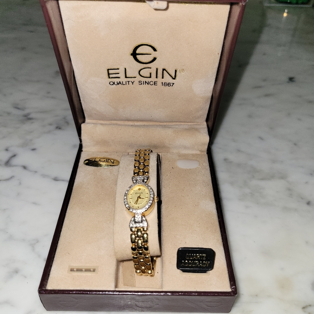 Elgin Ladies Gold Tone Diamond Bezel Watch